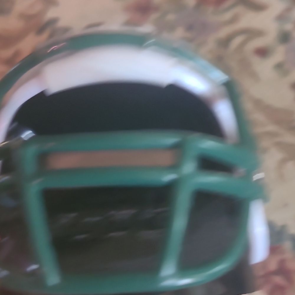 Green and White Football Helmet